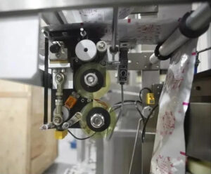 Detajet e makinës së paketimit të vulave të pasme - Printer kodimi me shirita